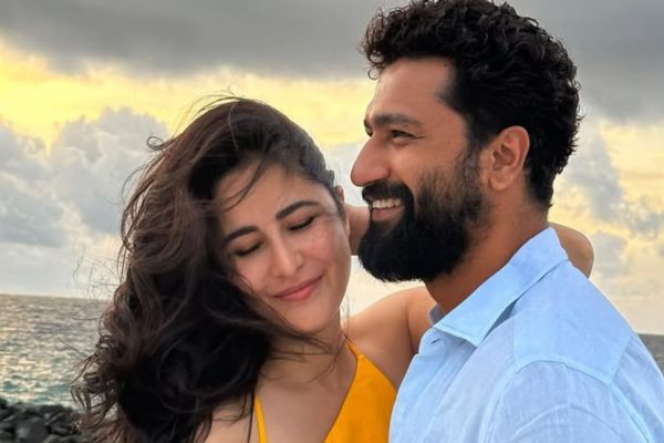 black cat golden retriever couple