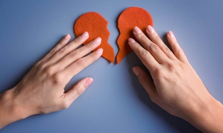 Hands Piecing Together Broken Heart, Heartbreak Survival Guide