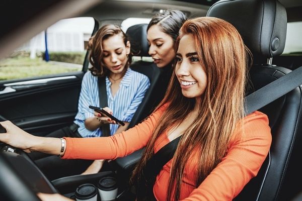 Earth Day- Three girl friends in a car