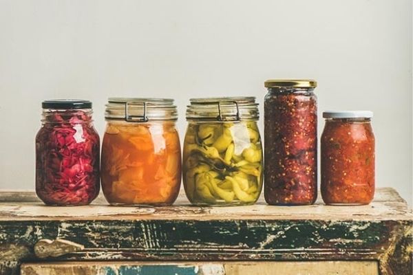 Colourful jars of fermented foods