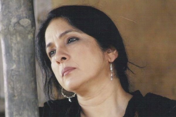 Neena Gupta's Autobiography: Neena Gupta is seen in a still from one of her films in a black suit