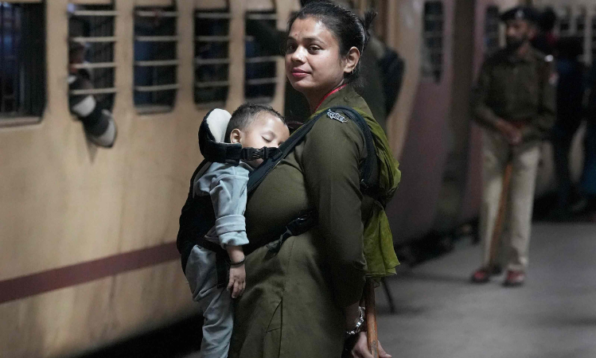 rpf constable carrying baby